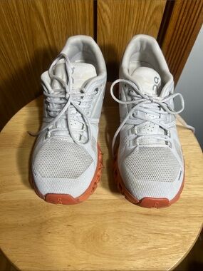 On Running White and Orange Women's Athletic Sneakers